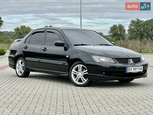Чорний Міцубісі Lancer, об'ємом двигуна 2 л та пробігом 275 тис. км за 5300 $, фото 4 на Automoto.ua