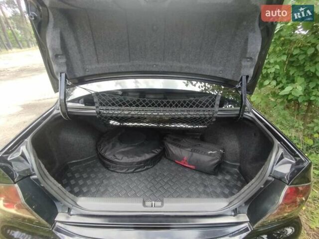Черный Мицубиси Лансер, объемом двигателя 1.6 л и пробегом 270 тыс. км за 5200 $, фото 11 на Automoto.ua