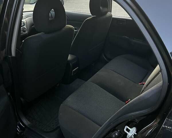 Черный Мицубиси Лансер, объемом двигателя 1.6 л и пробегом 131 тыс. км за 4350 $, фото 8 на Automoto.ua