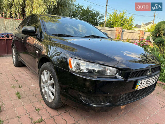 Черный Мицубиси Лансер, объемом двигателя 1.5 л и пробегом 111 тыс. км за 7500 $, фото 2 на Automoto.ua