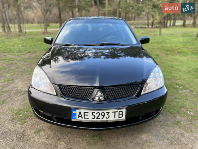 Чорний Міцубісі Lancer, об'ємом двигуна 1.6 л та пробігом 224 тис. км за 4950 $, фото 1 на Automoto.ua