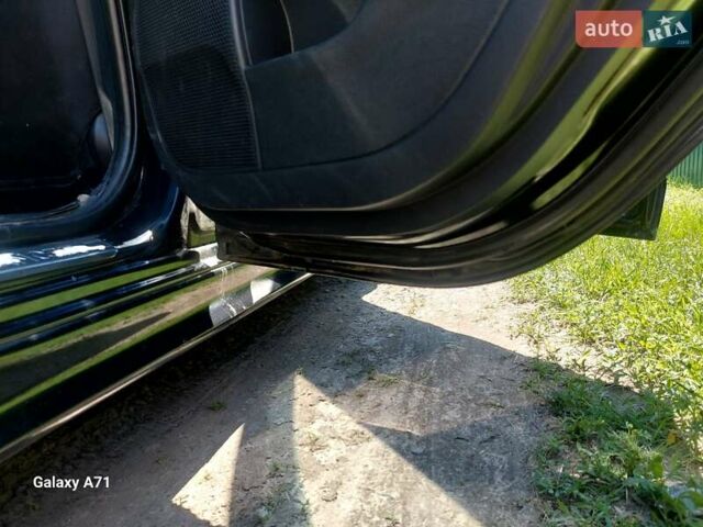Черный Мицубиси Лансер, объемом двигателя 2 л и пробегом 244 тыс. км за 6600 $, фото 6 на Automoto.ua