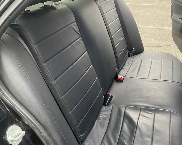 Черный Мицубиси Лансер, объемом двигателя 1.58 л и пробегом 263 тыс. км за 4000 $, фото 33 на Automoto.ua