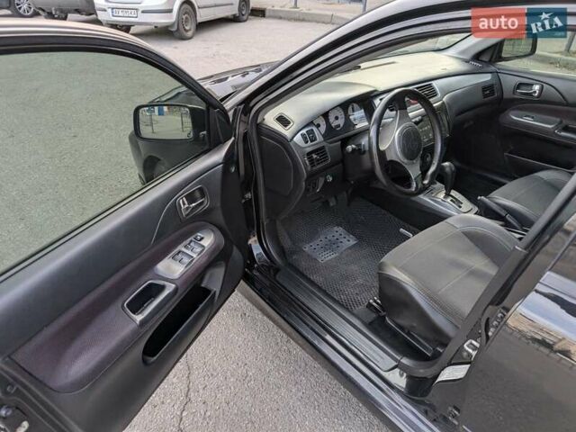 Чорний Міцубісі Lancer, об'ємом двигуна 2 л та пробігом 152 тис. км за 5500 $, фото 15 на Automoto.ua