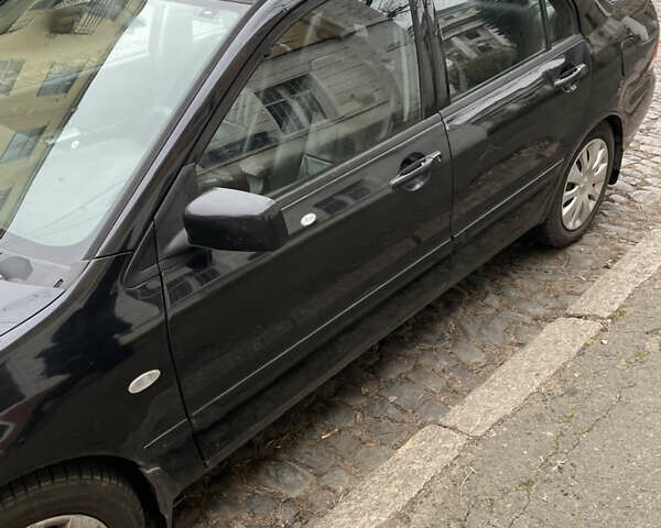 Чорний Міцубісі Lancer, об'ємом двигуна 1.6 л та пробігом 213 тис. км за 3000 $, фото 2 на Automoto.ua