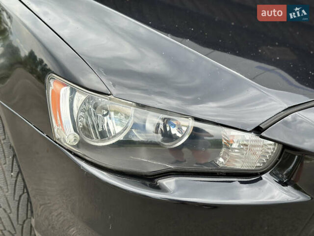 Чорний Міцубісі Lancer, об'ємом двигуна 2 л та пробігом 192 тис. км за 6500 $, фото 33 на Automoto.ua
