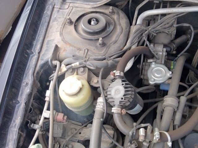 Чорний Міцубісі Lancer, об'ємом двигуна 1.6 л та пробігом 255 тис. км за 5000 $, фото 5 на Automoto.ua