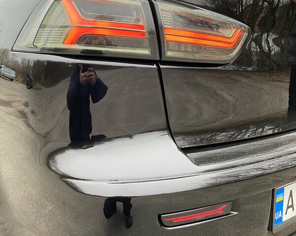 Черный Мицубиси Лансер, объемом двигателя 2 л и пробегом 164 тыс. км за 8300 $, фото 17 на Automoto.ua