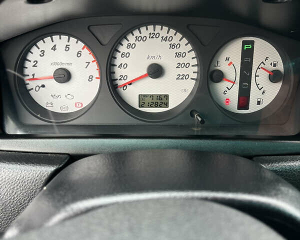 Чорний Міцубісі Lancer, об'ємом двигуна 1.6 л та пробігом 212 тис. км за 4700 $, фото 14 на Automoto.ua