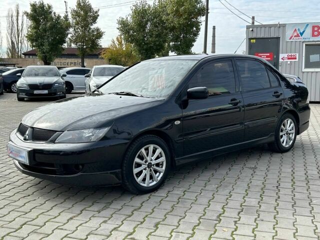 Мицубиси Лансер 2007 в Кривом Роге на Automoto.ua Черный Мицубиси Лансер, объемом двигателя 2 л и пробегом 143 тыс. км за 5400 $, фото 2 на Automoto.ua