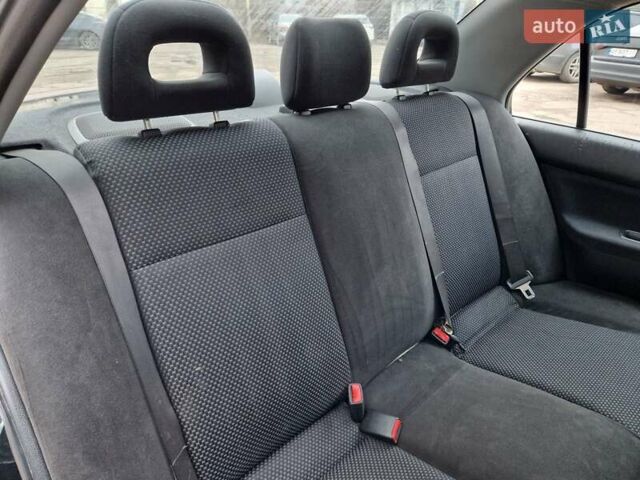 Чорний Міцубісі Lancer, об'ємом двигуна 1.6 л та пробігом 273 тис. км за 3999 $, фото 27 на Automoto.ua