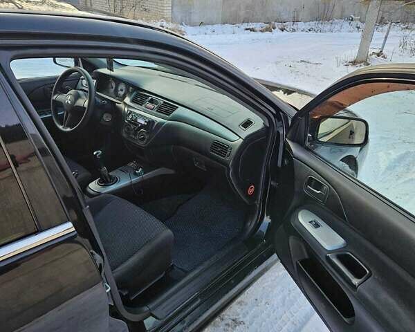 Чорний Міцубісі Lancer, об'ємом двигуна 1.6 л та пробігом 240 тис. км за 3500 $, фото 9 на Automoto.ua