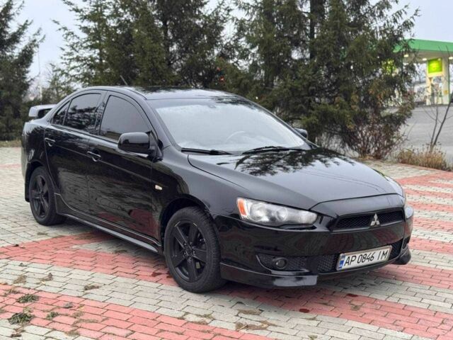 Черный Мицубиси Лансер, объемом двигателя 2 л и пробегом 217 тыс. км за 5500 $, фото 2 на Automoto.ua