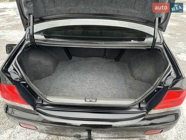 Чорний Міцубісі Lancer, об'ємом двигуна 1.6 л та пробігом 160 тис. км за 4600 $, фото 13 на Automoto.ua