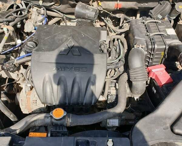 Черный Мицубиси Лансер, объемом двигателя 1.5 л и пробегом 240 тыс. км за 6900 $, фото 8 на Automoto.ua