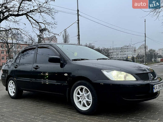 Чорний Міцубісі Lancer, об'ємом двигуна 1.6 л та пробігом 303 тис. км за 4350 $, фото 12 на Automoto.ua