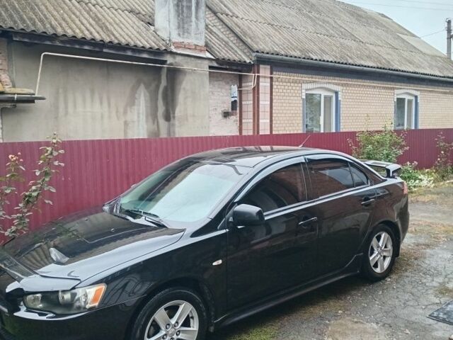 Чорний Міцубісі Lancer, об'ємом двигуна 2 л та пробігом 273 тис. км за 7100 $, фото 2 на Automoto.ua