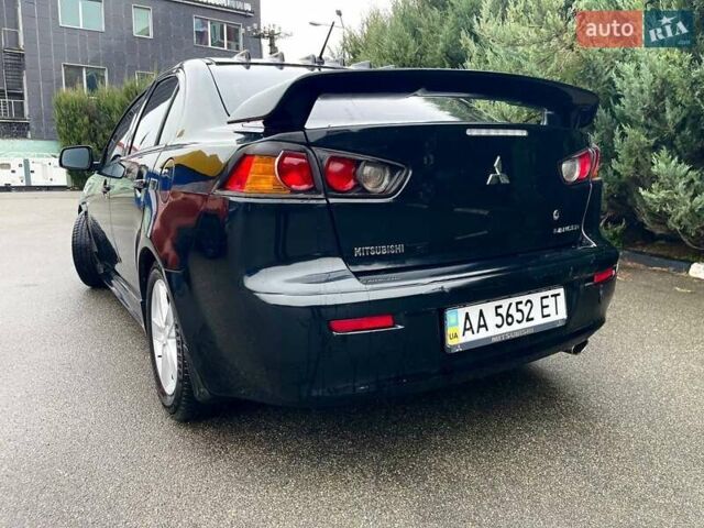 Чорний Міцубісі Lancer, об'ємом двигуна 2 л та пробігом 69 тис. км за 5700 $, фото 7 на Automoto.ua