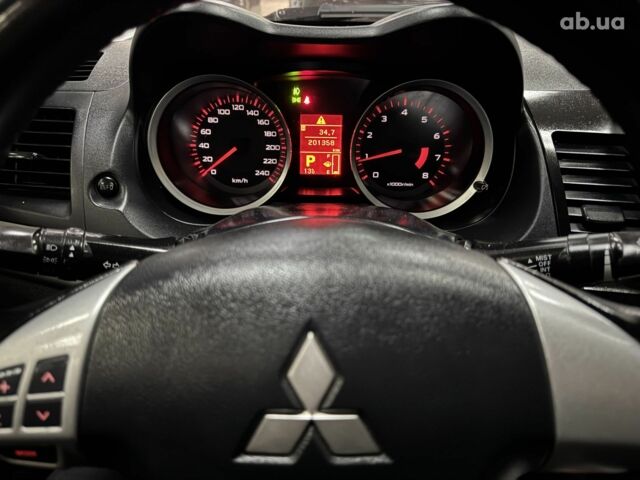 Черный Мицубиси Лансер, объемом двигателя 0 л и пробегом 201 тыс. км за 6900 $, фото 2 на Automoto.ua