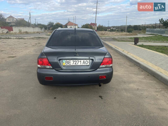 Чорний Міцубісі Lancer, об'ємом двигуна 1.6 л та пробігом 162 тис. км за 4650 $, фото 3 на Automoto.ua