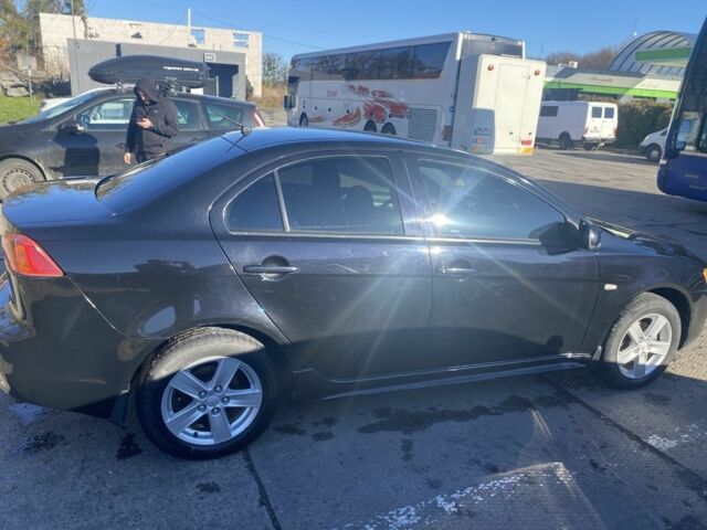 Черный Мицубиси Лансер, объемом двигателя 2 л и пробегом 372 тыс. км за 6200 $, фото 7 на Automoto.ua