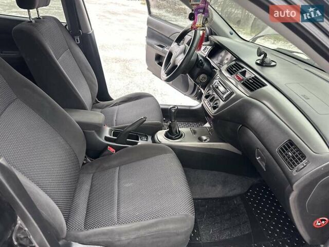 Чорний Міцубісі Lancer, об'ємом двигуна 1.6 л та пробігом 160 тис. км за 4600 $, фото 8 на Automoto.ua