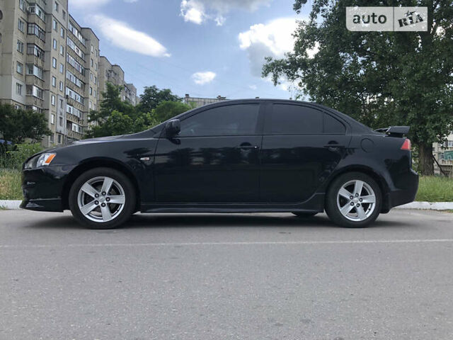 Чорний Міцубісі Lancer, об'ємом двигуна 2 л та пробігом 185 тис. км за 6950 $, фото 5 на Automoto.ua