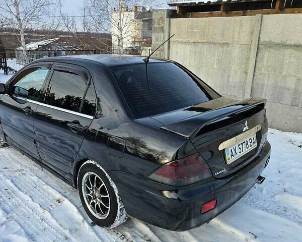 Чорний Міцубісі Lancer, об'ємом двигуна 1.6 л та пробігом 240 тис. км за 3500 $, фото 5 на Automoto.ua
