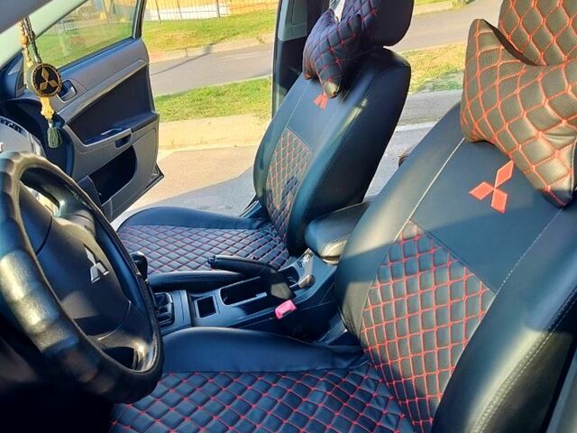 Черный Мицубиси Лансер, объемом двигателя 1.5 л и пробегом 215 тыс. км за 5600 $, фото 8 на Automoto.ua