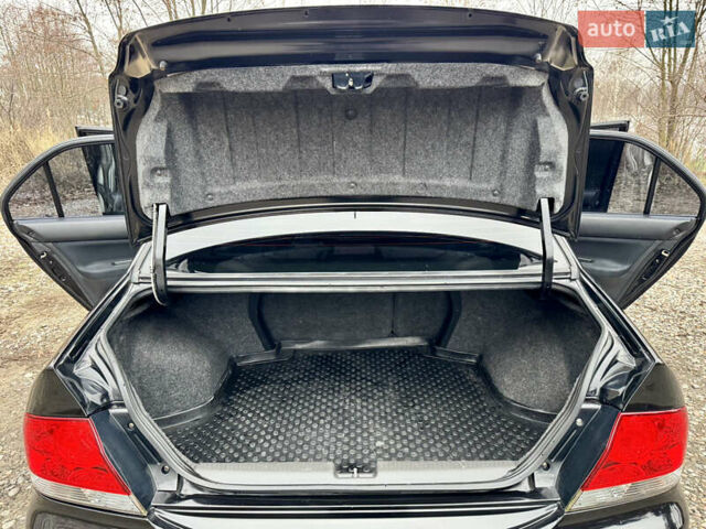 Черный Мицубиси Лансер, объемом двигателя 1.6 л и пробегом 216 тыс. км за 4990 $, фото 21 на Automoto.ua