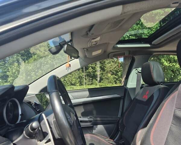Чорний Міцубісі Lancer, об'ємом двигуна 2 л та пробігом 243 тис. км за 6600 $, фото 12 на Automoto.ua
