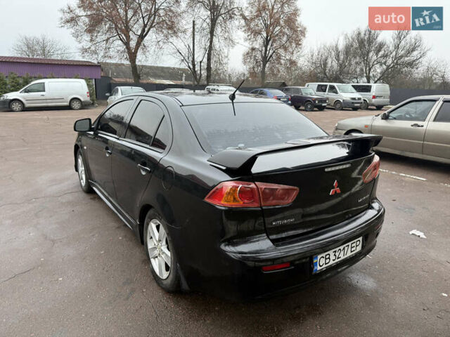 Чорний Міцубісі Lancer, об'ємом двигуна 2 л та пробігом 281 тис. км за 6000 $, фото 11 на Automoto.ua