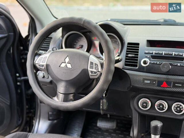 Мицубиси Лансер 2007 в Днепре (Днепропетровске) на Automoto.ua Черный Мицубиси Лансер, объемом двигателя 2 л и пробегом 223 тыс. км за 6300 $, фото 13 на Automoto.ua