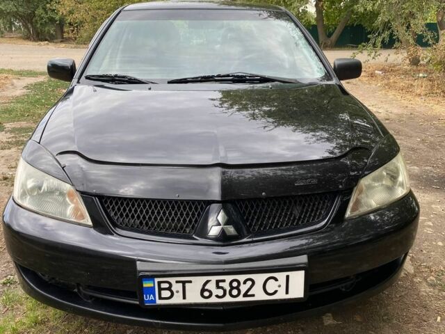 Чорний Міцубісі Lancer, об'ємом двигуна 1.6 л та пробігом 232 тис. км за 4200 $, фото 1 на Automoto.ua