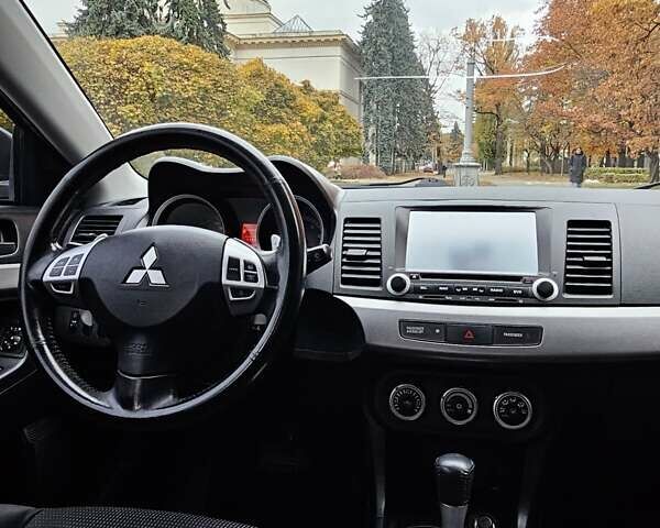 Міцубісі Lancer 2007 у Києві на Automoto.ua Чорний Міцубісі Lancer, об'ємом двигуна 2 л та пробігом 115 тис. км за 5000 $, фото 19 на Automoto.ua