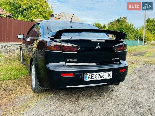 Чорний Міцубісі Lancer, об'ємом двигуна 2 л та пробігом 284 тис. км за 6200 $, фото 9 на Automoto.ua