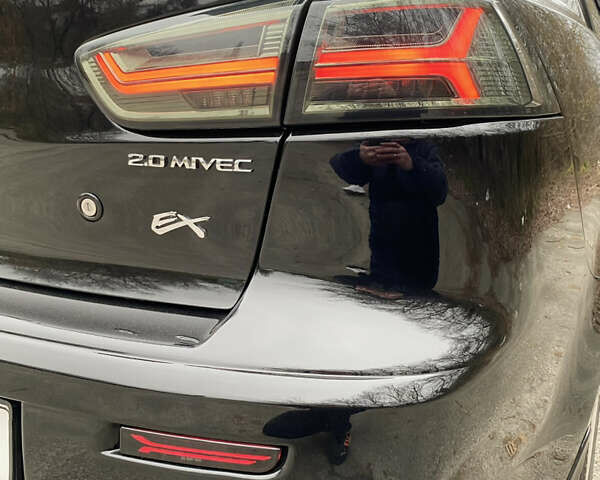 Черный Мицубиси Лансер, объемом двигателя 2 л и пробегом 164 тыс. км за 8300 $, фото 15 на Automoto.ua