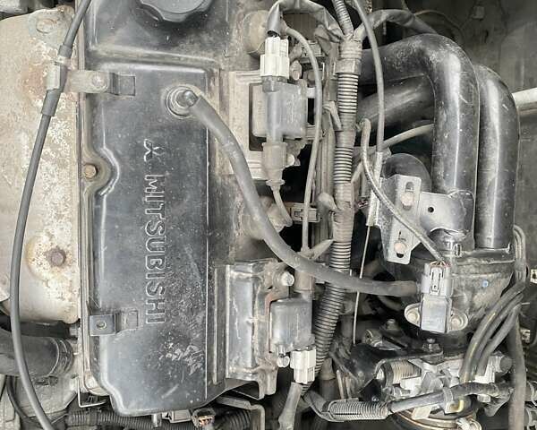 Черный Мицубиси Лансер, объемом двигателя 1.58 л и пробегом 263 тыс. км за 4000 $, фото 22 на Automoto.ua