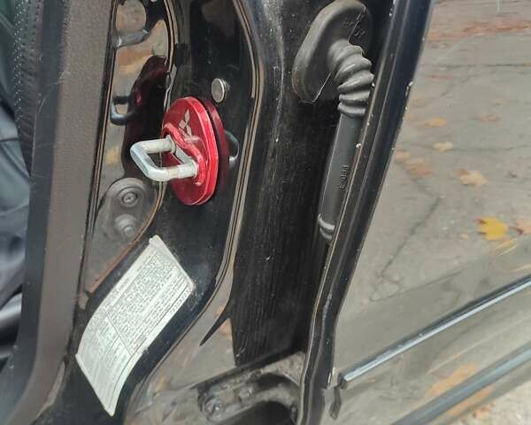 Мицубиси Лансер 2007 в Южноукраинске на Automoto.ua Черный Мицубиси Лансер, объемом двигателя 2 л и пробегом 161 тыс. км за 4600 $, фото 11 на Automoto.ua