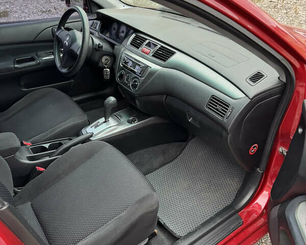 Чорний Міцубісі Lancer, об'ємом двигуна 1.6 л та пробігом 195 тис. км за 5000 $, фото 14 на Automoto.ua