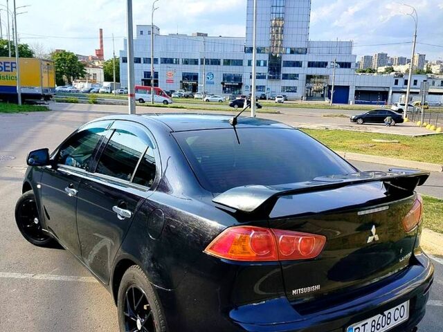 Черный Мицубиси Лансер, объемом двигателя 1.5 л и пробегом 215 тыс. км за 5600 $, фото 3 на Automoto.ua