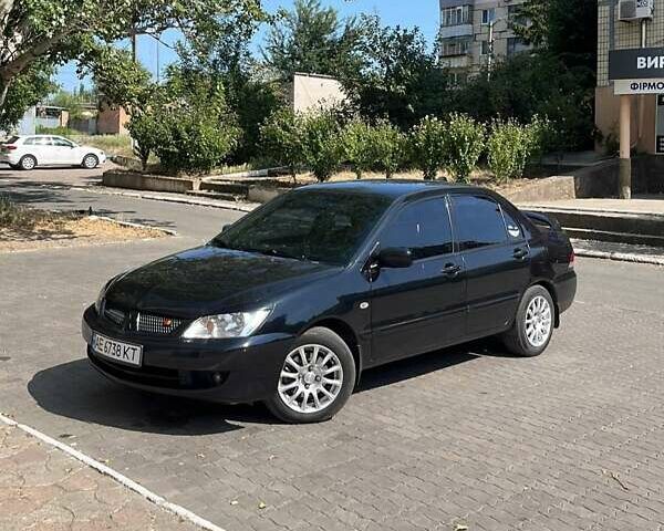 Черный Мицубиси Лансер, объемом двигателя 1.6 л и пробегом 249 тыс. км за 5000 $, фото 5 на Automoto.ua