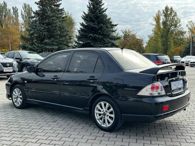 Мицубиси Лансер 2007 в Кривом Роге на Automoto.ua Черный Мицубиси Лансер, объемом двигателя 2 л и пробегом 143 тыс. км за 5400 $, фото 4 на Automoto.ua