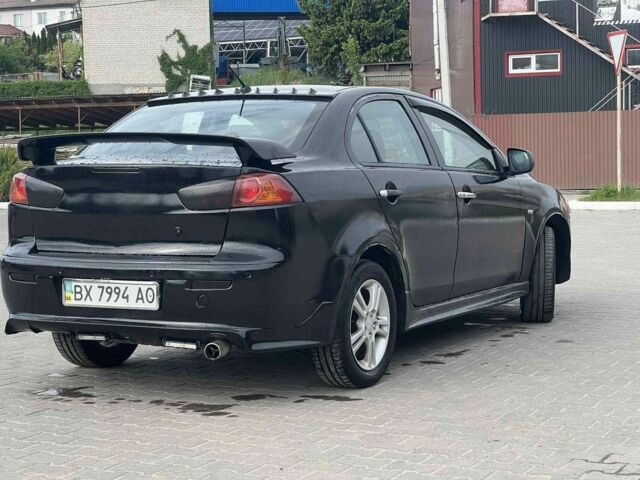 Черный Мицубиси Лансер, объемом двигателя 2 л и пробегом 350 тыс. км за 4299 $, фото 3 на Automoto.ua