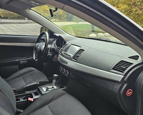 Міцубісі Lancer 2007 у Києві на Automoto.ua Чорний Міцубісі Lancer, об'ємом двигуна 2 л та пробігом 115 тис. км за 5000 $, фото 11 на Automoto.ua