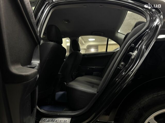 Черный Мицубиси Лансер, объемом двигателя 0 л и пробегом 201 тыс. км за 6900 $, фото 6 на Automoto.ua