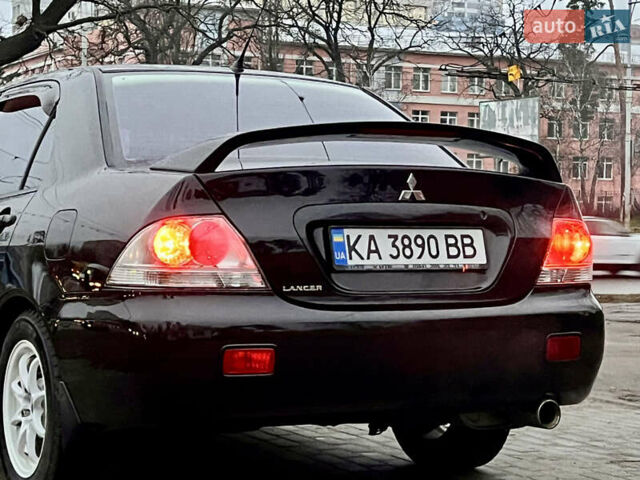 Чорний Міцубісі Lancer, об'ємом двигуна 1.6 л та пробігом 303 тис. км за 4350 $, фото 19 на Automoto.ua