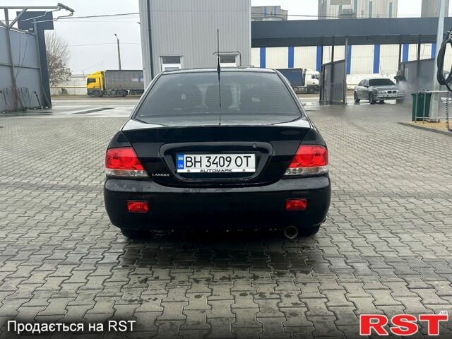Чорний Міцубісі Lancer, об'ємом двигуна 1.6 л та пробігом 248 тис. км за 3950 $, фото 3 на Automoto.ua