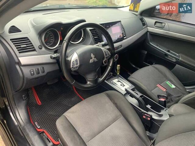 Чорний Міцубісі Lancer, об'ємом двигуна 2 л та пробігом 216 тис. км за 6200 $, фото 8 на Automoto.ua