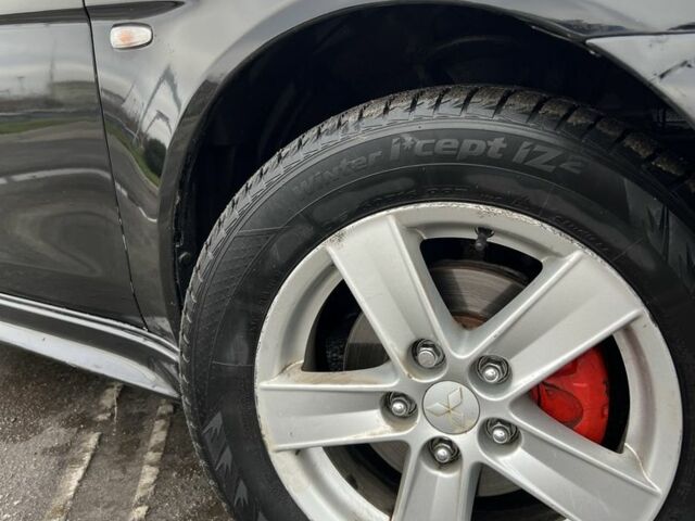 Черный Мицубиси Лансер, объемом двигателя 2 л и пробегом 350 тыс. км за 6700 $, фото 7 на Automoto.ua